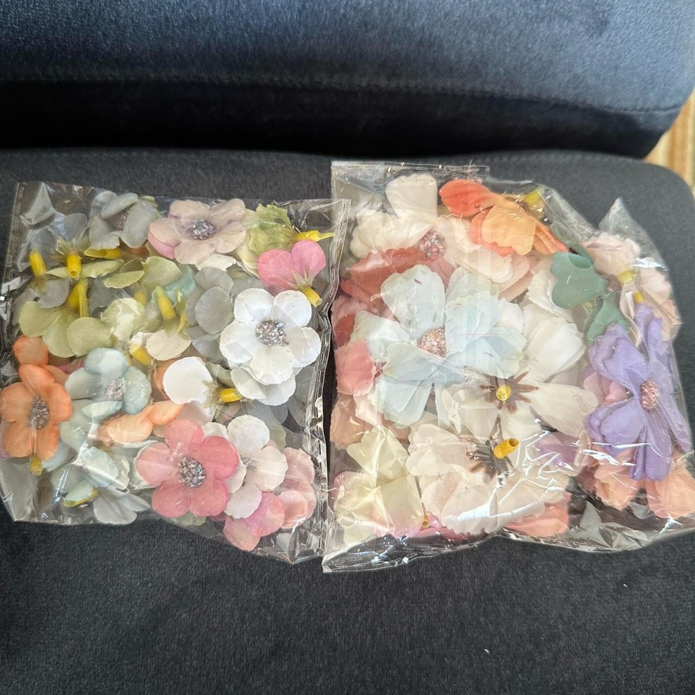 Lots of small and large fake flowers.